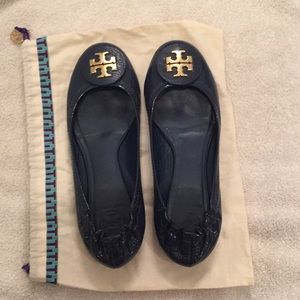 Tory Burch reva flat with a travel bag